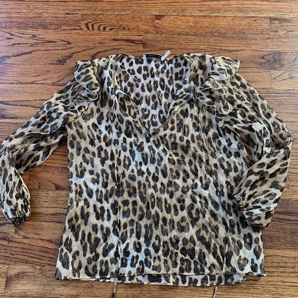 Designer Alice & Olivia sheer cheetah print top